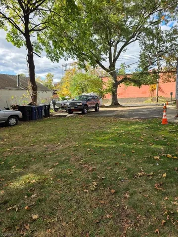 a view of a garden with trees