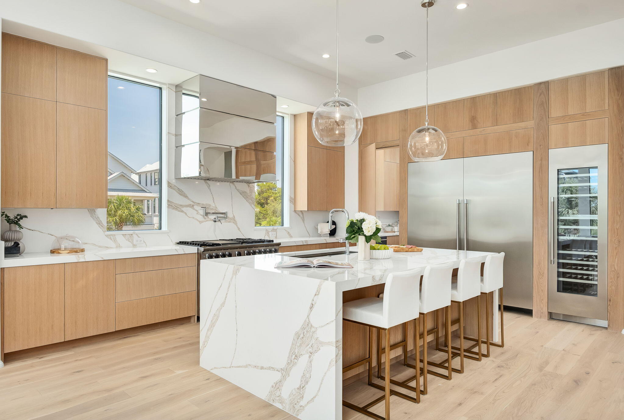 238 Sand Oaks Circle Santa Rosa Beach, FL 32459 - Photo 11 of 26 a large kitchen with a table and chairs
