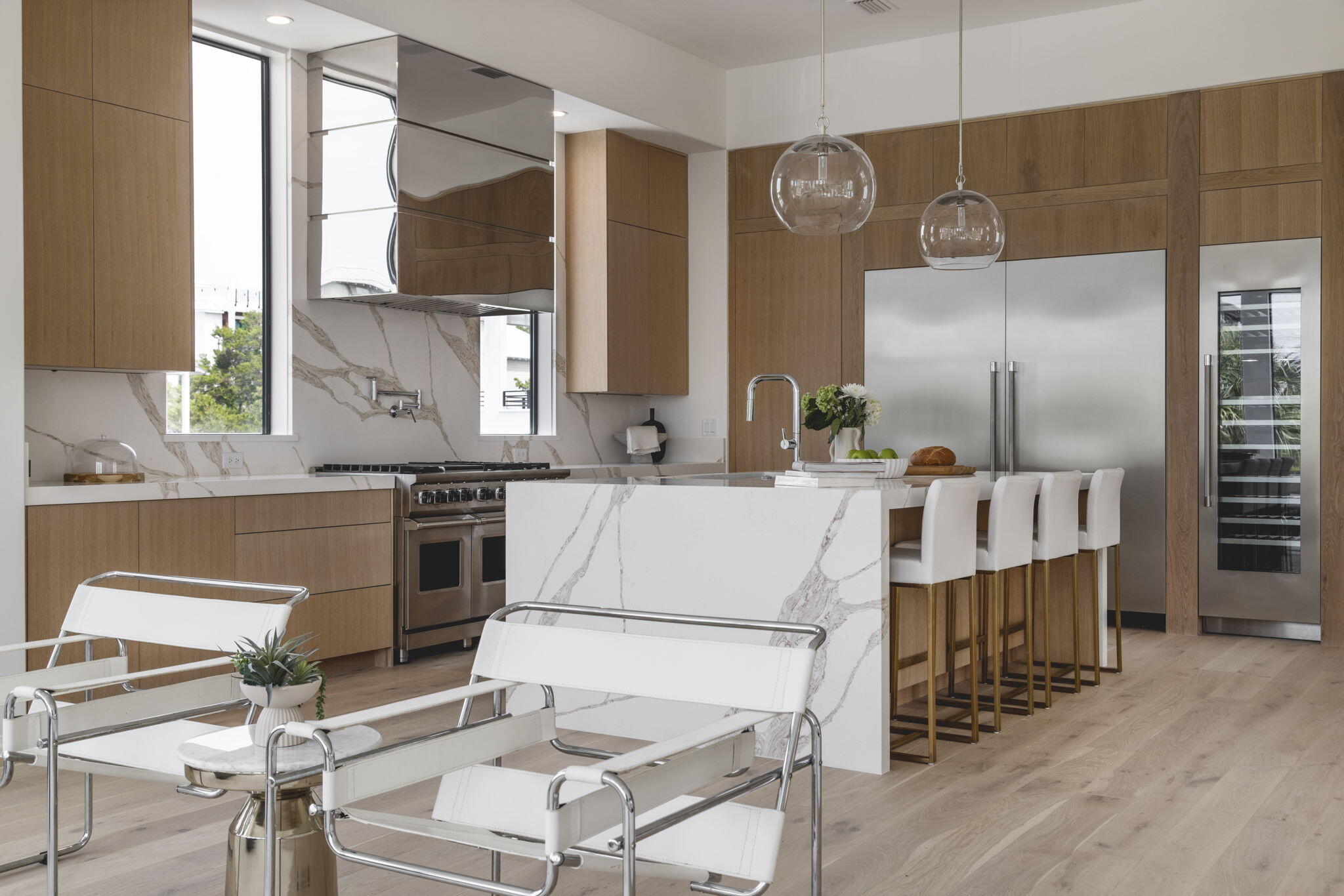 238 Sand Oaks Circle Santa Rosa Beach, FL 32459 - Photo 13 of 26 a kitchen with stainless steel appliances kitchen island granite countertop a sink and cabinets