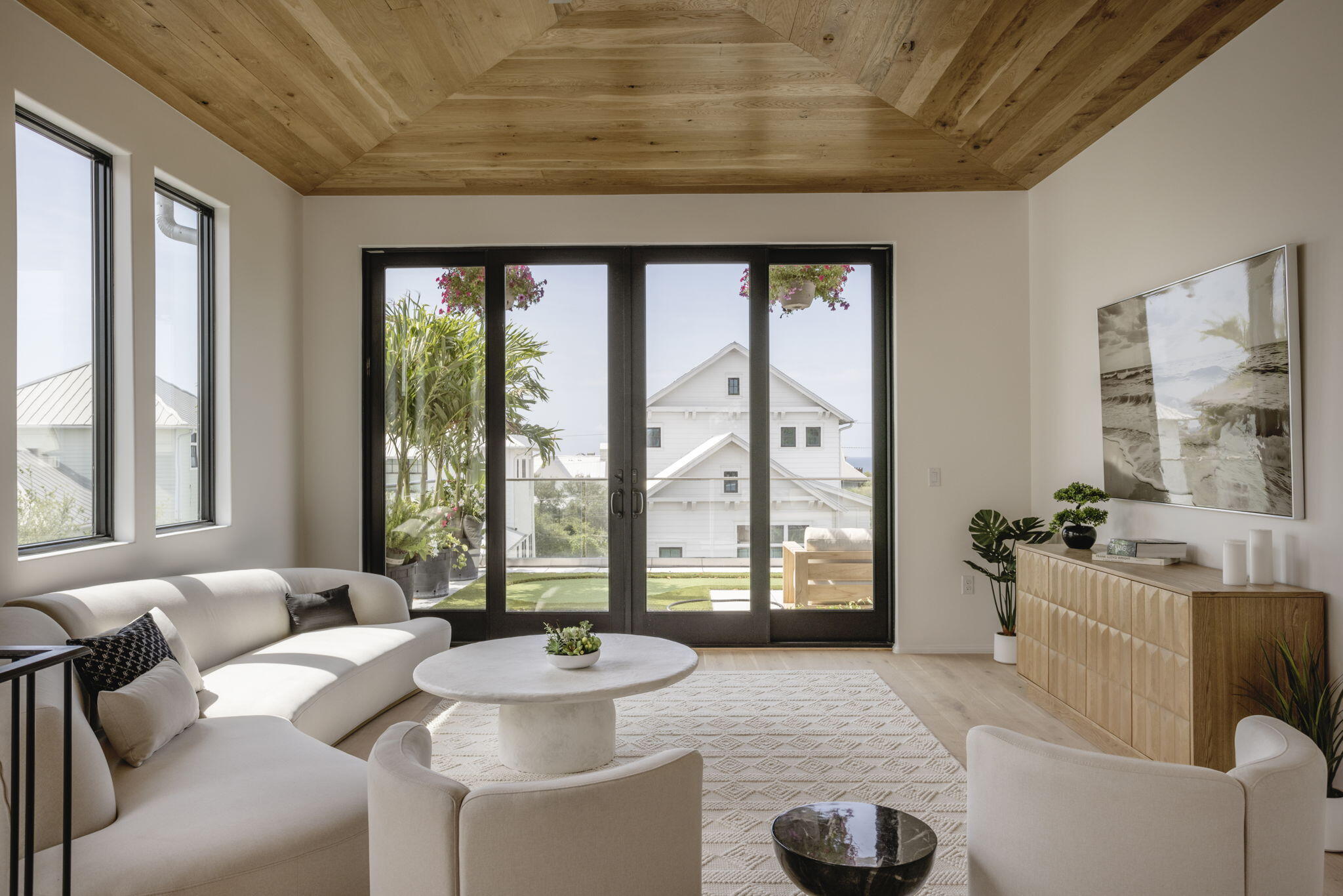 238 Sand Oaks Circle Santa Rosa Beach, FL 32459 - Photo 18 of 26 a living room with furniture and a large window