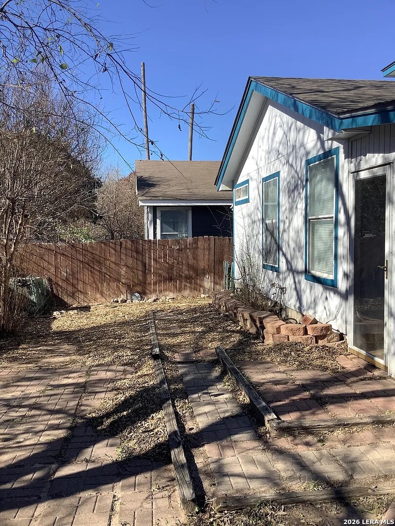 9502 Swans Crossing San Antonio, TX 78250 - Photo 16 of 17 a view of house with yard