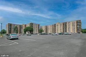 a view of a livingroom with furniture and a potted plant