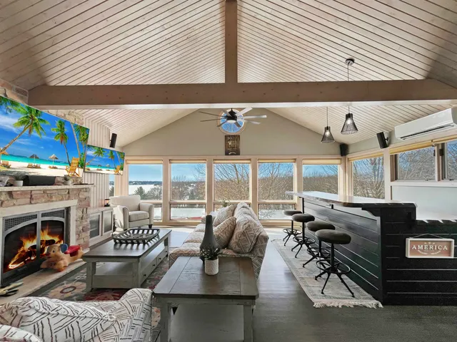 an outdoor living area with furniture