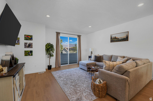 493 East Alice Way Layton, UT 84041 - Photo 9 of 31 Living area featuring light wood finished floors and recessed lighting