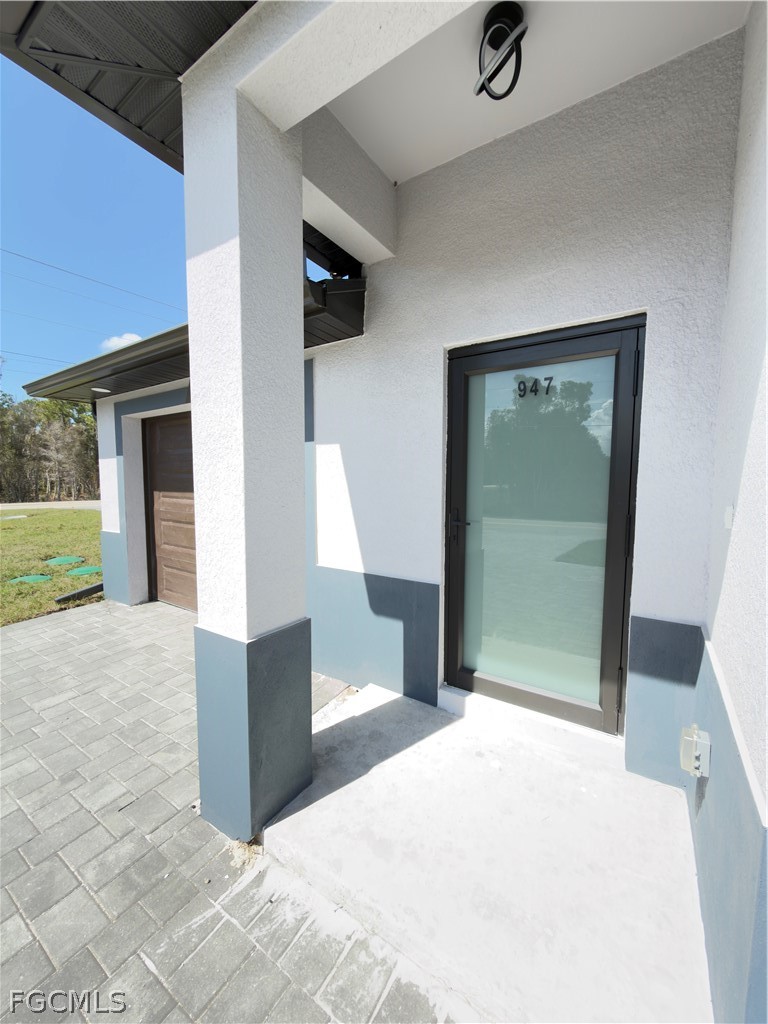 945 Homestead Road South Lehigh Acres, FL 33974 - Photo 3 of 47