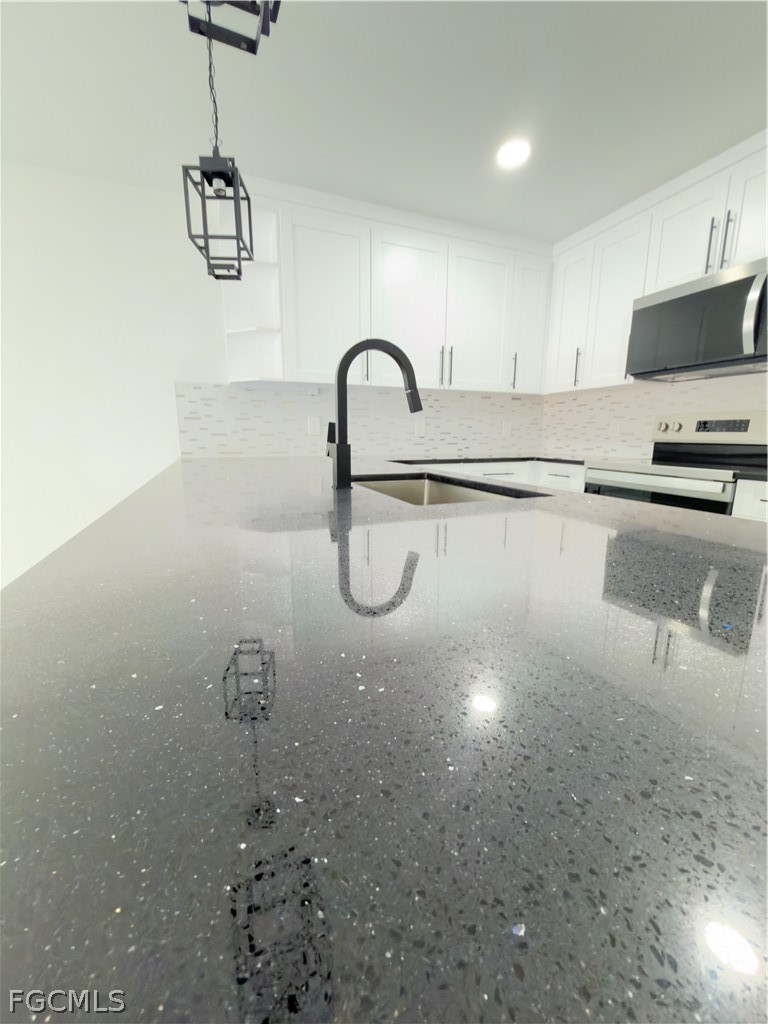 945 Homestead Road South Lehigh Acres, FL 33974 - Photo 34 of 47