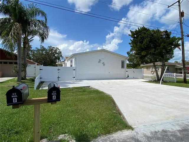 a house view with a garden space