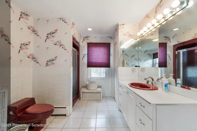 a bathroom with a bathtub and sink
