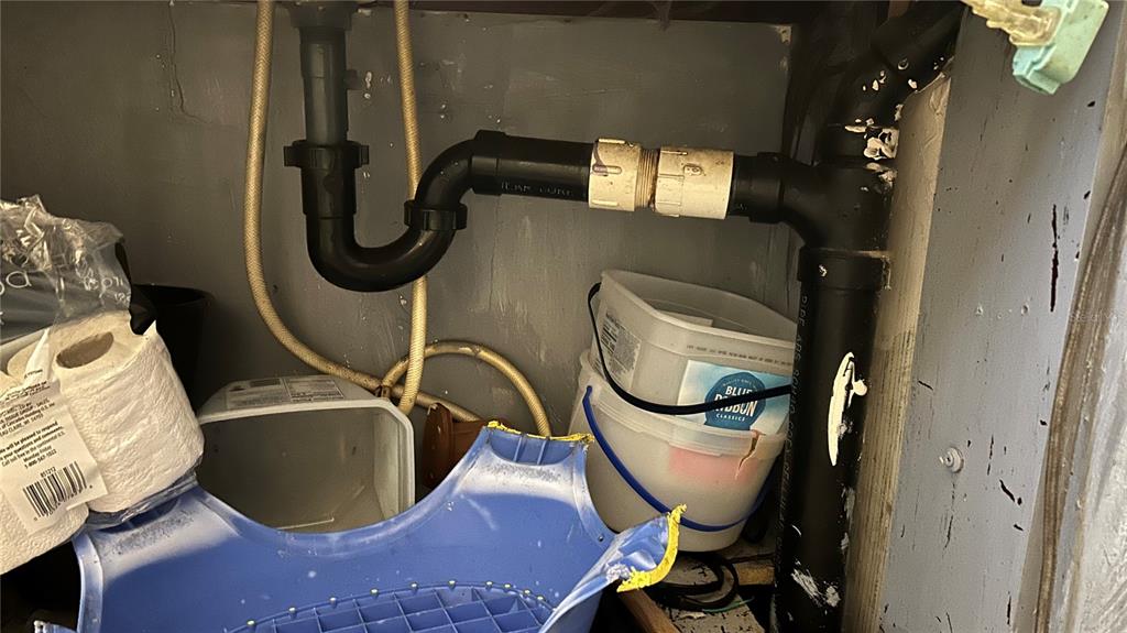 13752 Suwannee Boulevard O'Brien, FL 32071 - Photo 16 of 19 a bathroom with a sink mirror and a toilet