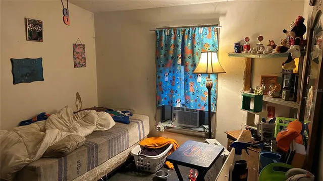 a room with furniture workspace and a window