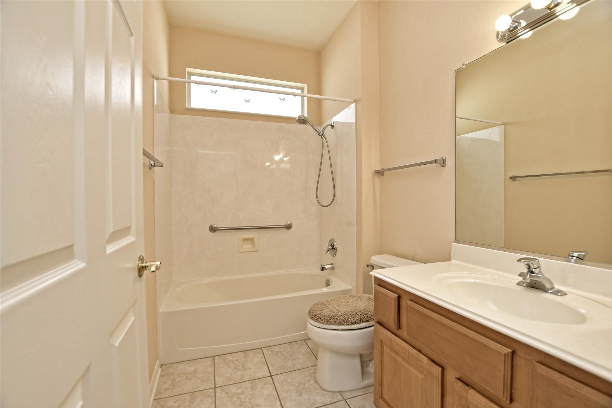 112 Bluebell Drive Georgetown, TX 78633 - Photo 23 of 23 a bathroom with a granite countertop sink toilet and shower