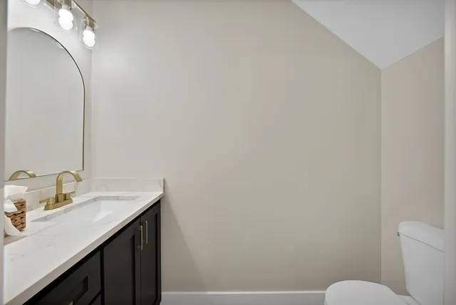 a aerial view of a house with a yard