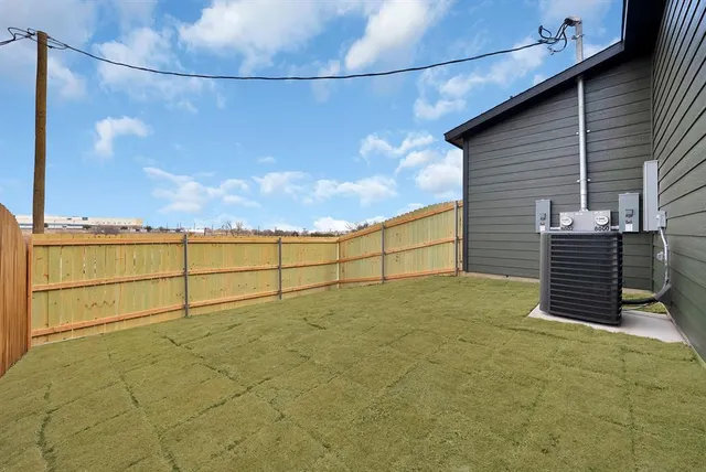 a view of backyard of house