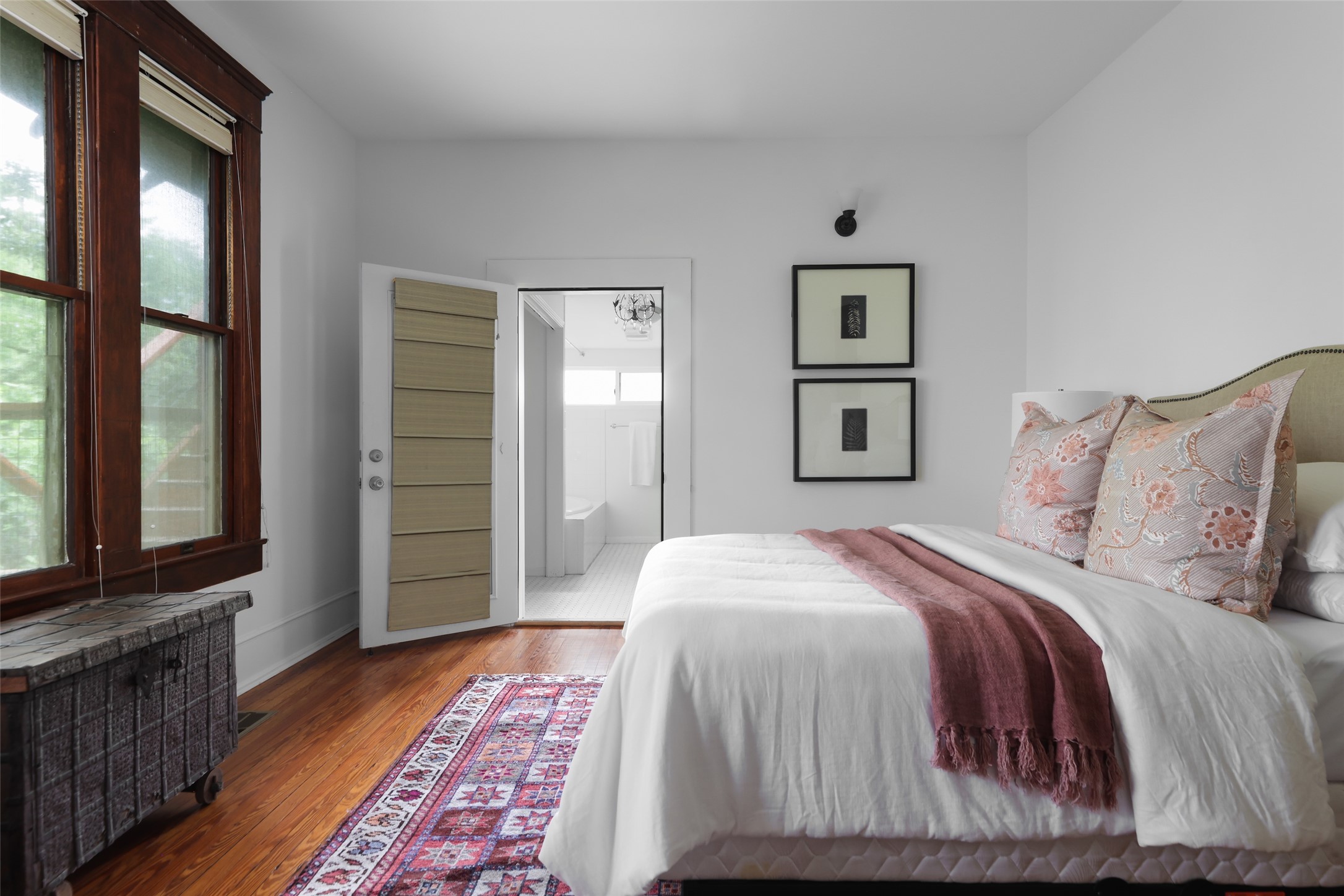 1917 Miles Avenue Austin, TX 78745 - Photo 17 of 39 a bedroom with a large bed and a window