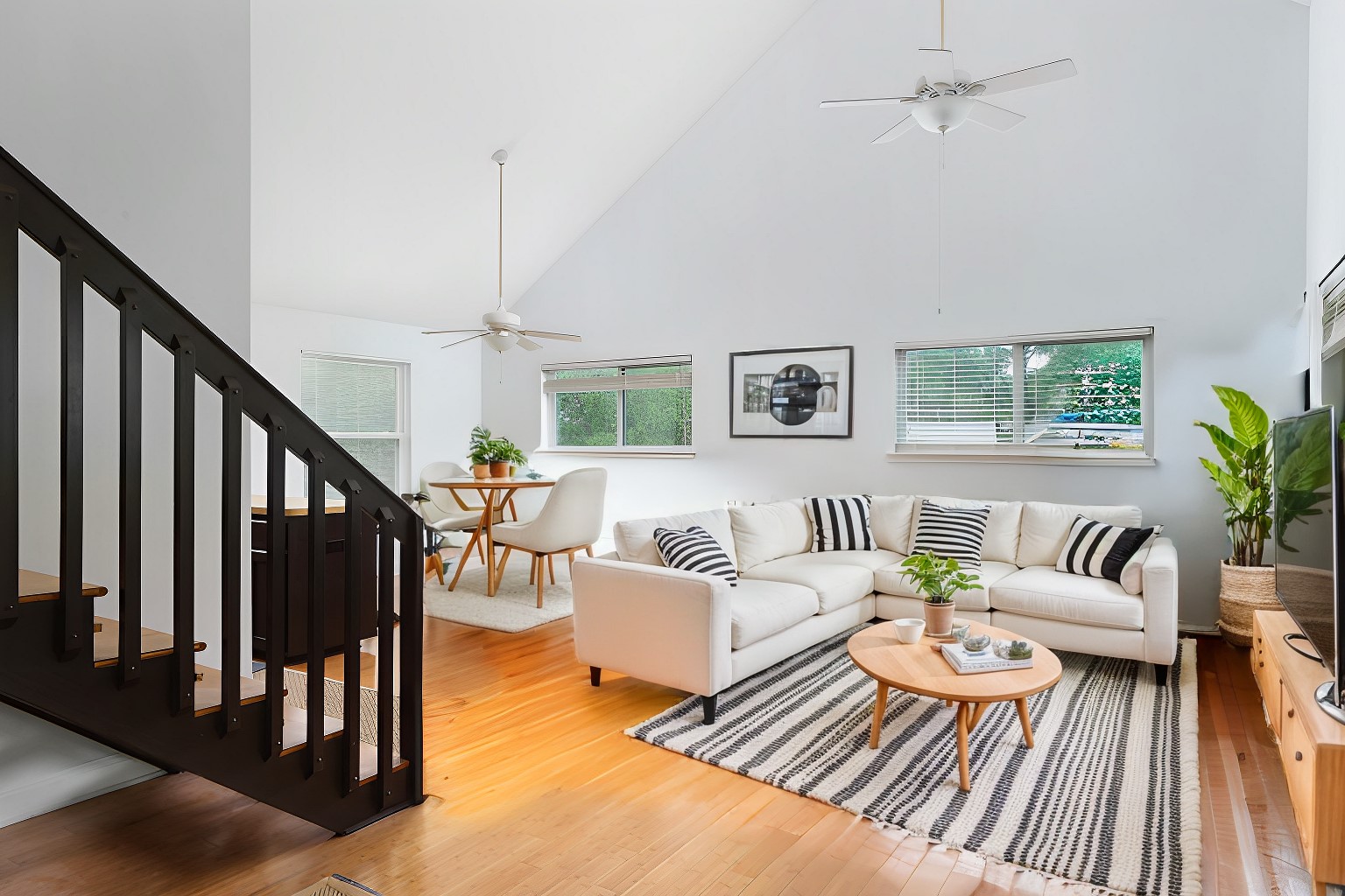 1917 Miles Avenue Austin, TX 78745 - Photo 24 of 39 a living room with furniture and wooden floor