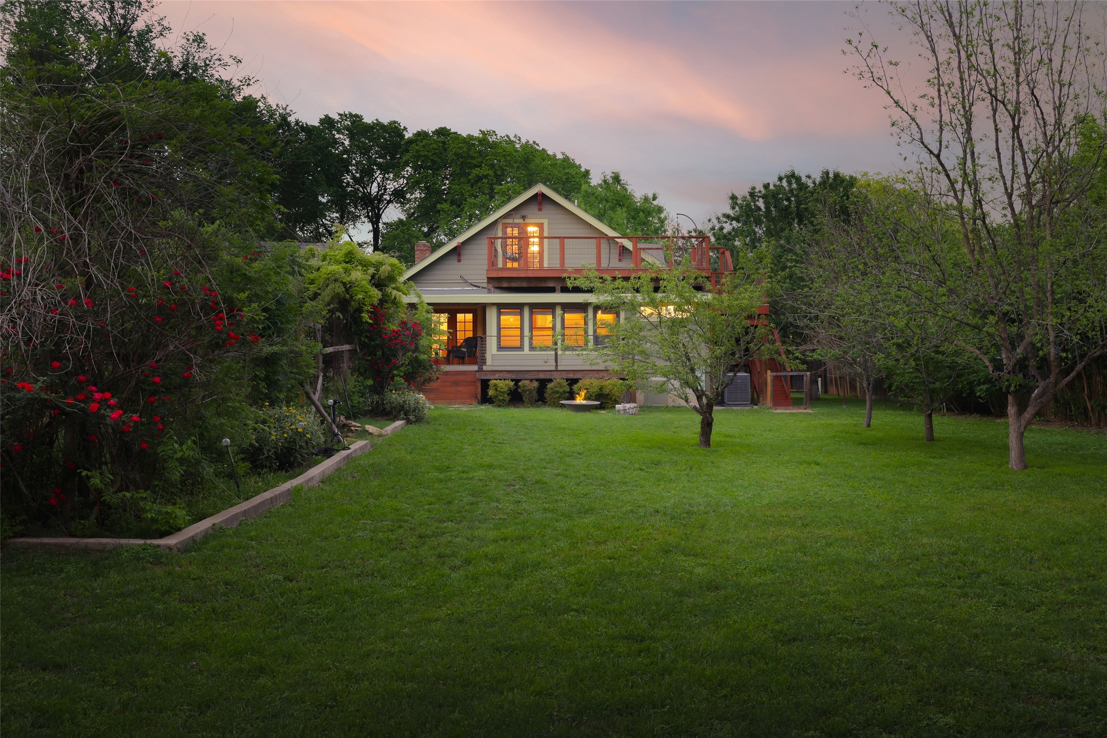 1917 Miles Avenue Austin, TX 78745 - Photo 28 of 39 a house with green field in front of it
