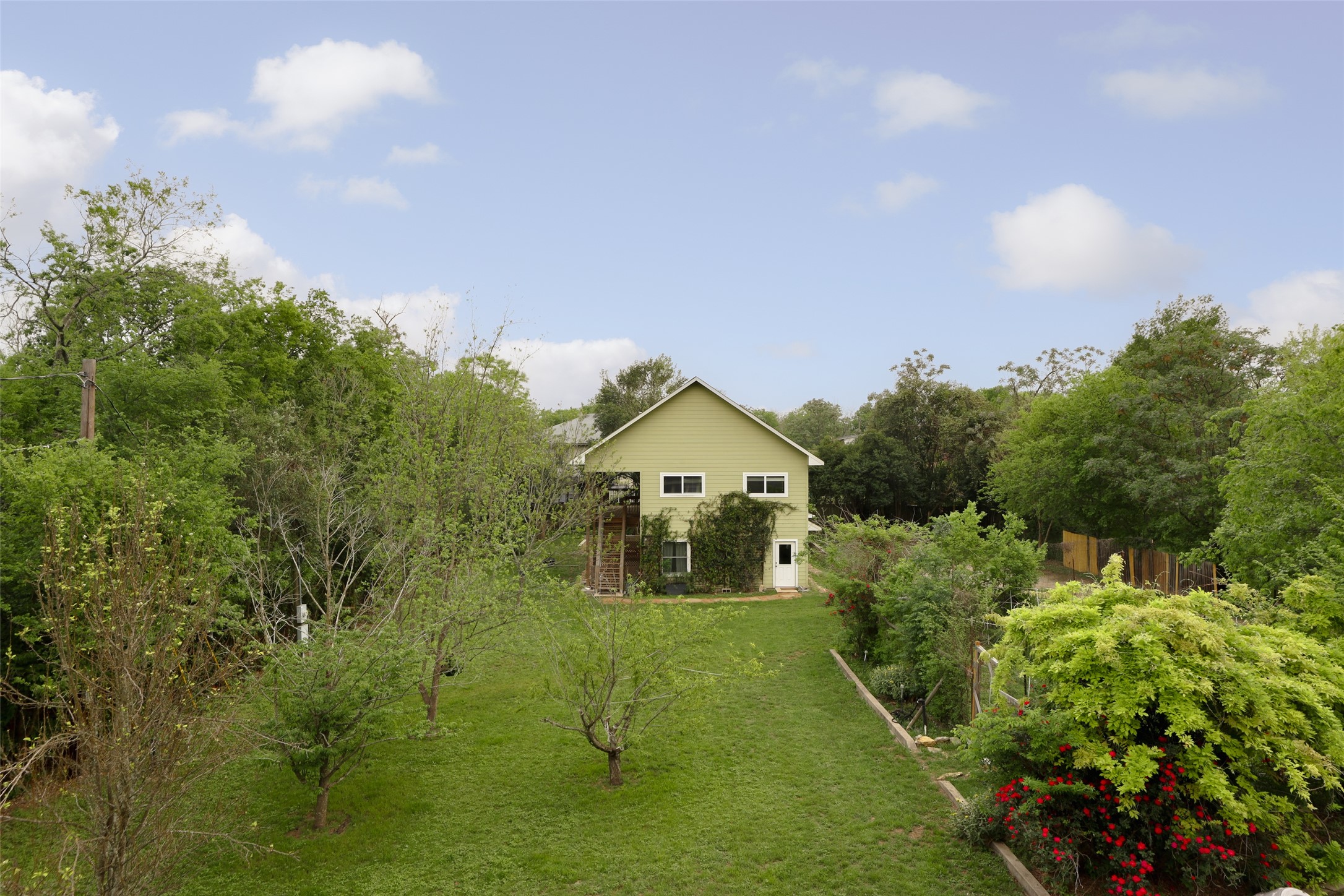 1917 Miles Avenue Austin, TX 78745 - Photo 31 of 39 a front view of a house with a yard