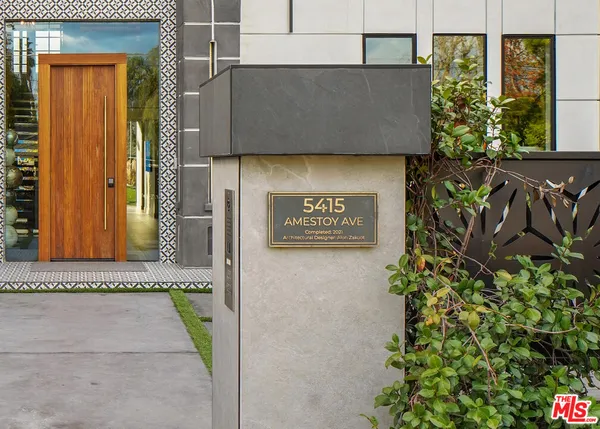 a sign that is on the side of a building