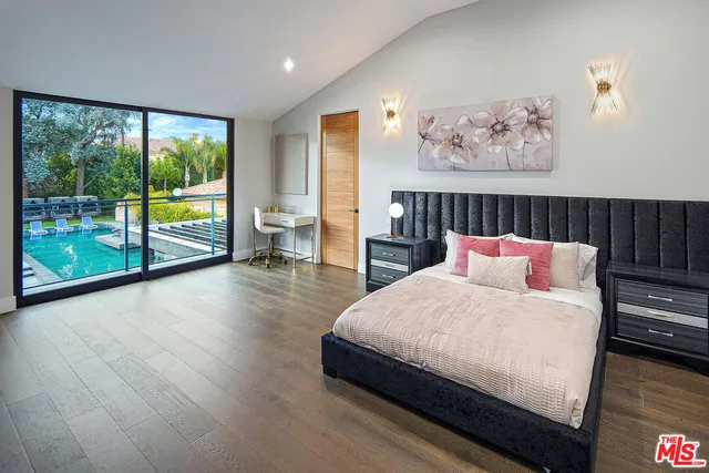 a view of a backyard with sitting area