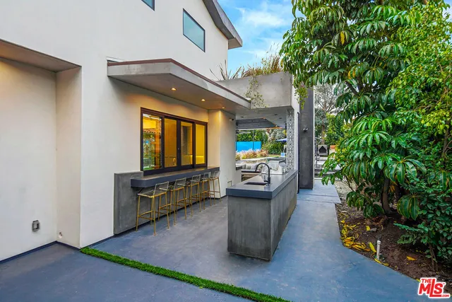 a view of a livingroom with furniture and window