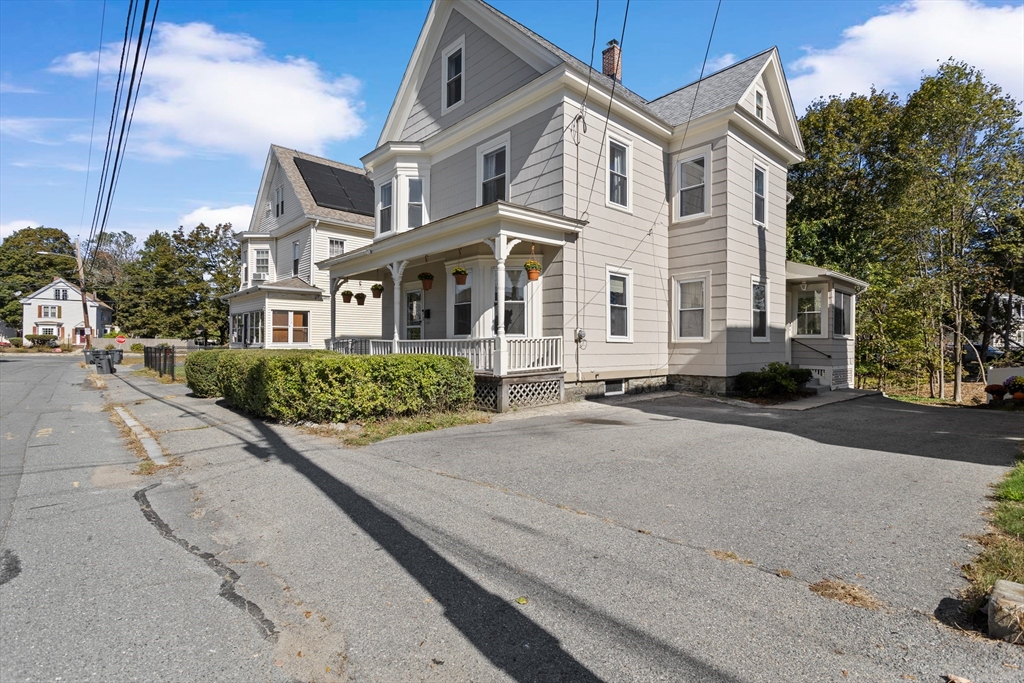 6 Barker Street Methuen, MA 01844 - Photo 3 of 42 a front view of a house with a yard