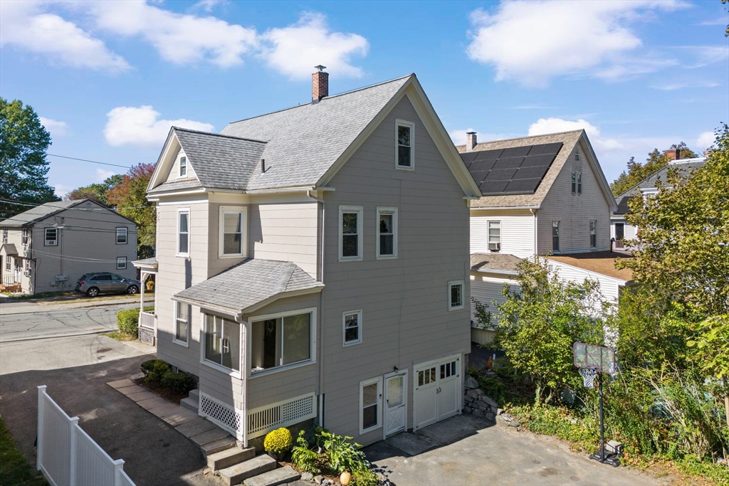 6 Barker Street Methuen, MA 01844 - Photo 4 of 42 a front view of a house with garden