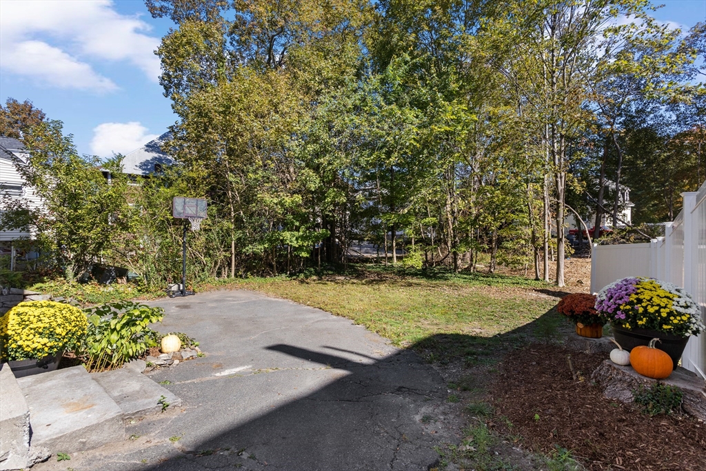 6 Barker Street Methuen, MA 01844 - Photo 42 of 42 a view of a backyard with large trees
