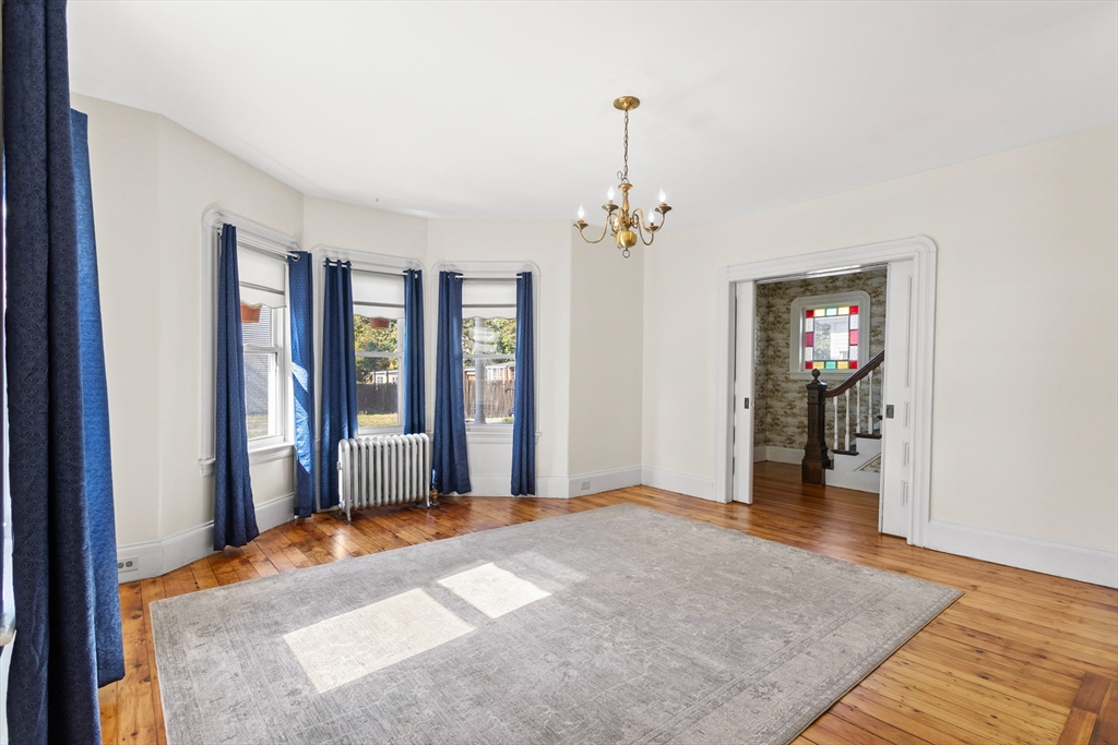 6 Barker Street Methuen, MA 01844 - Photo 10 of 42 a view of a room with window and hardwood floor