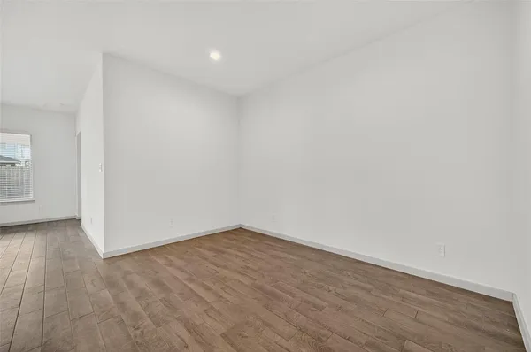 a view of kitchen with wooden floor