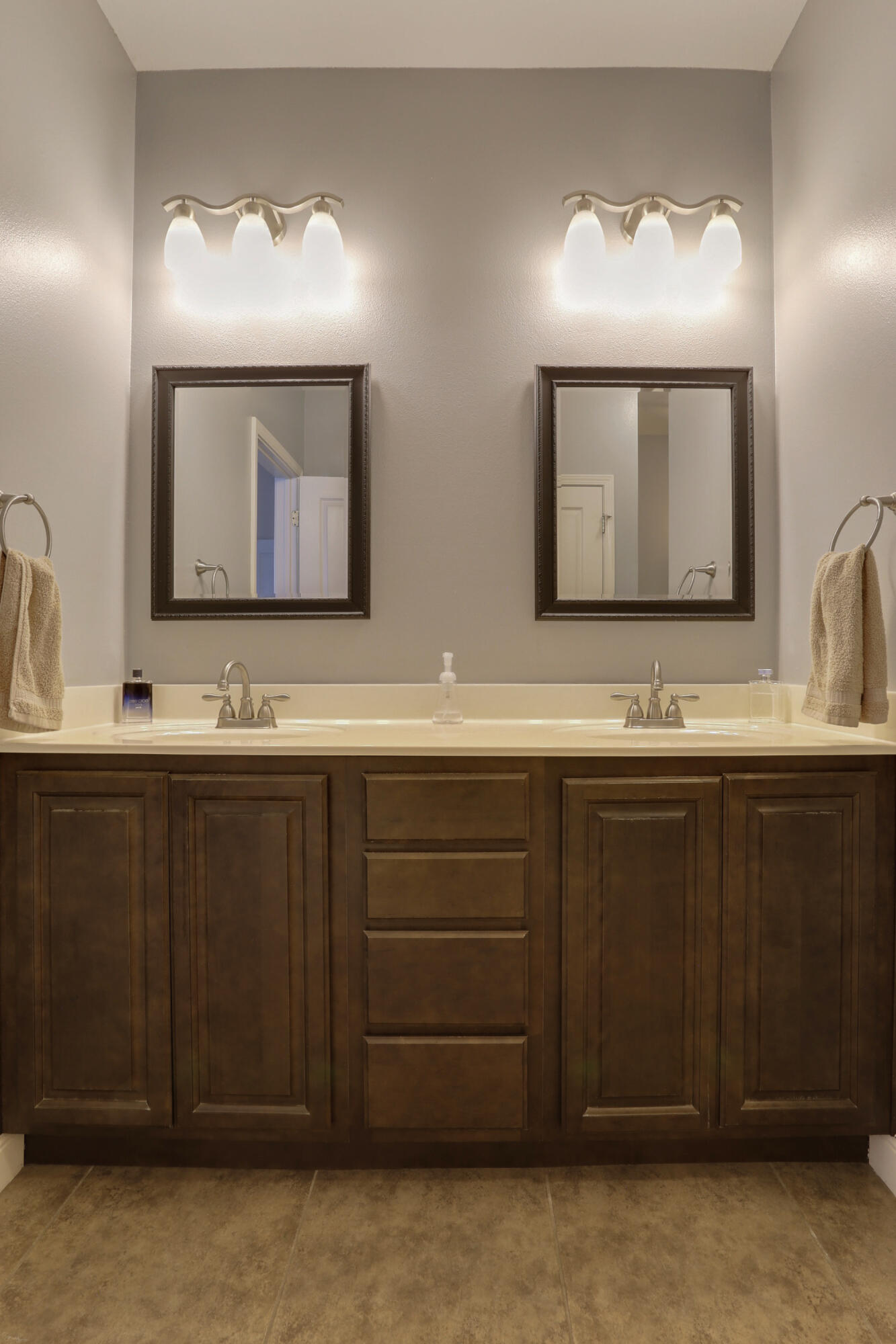 4539 Hermosa Road Crestview, FL 32539 - Photo 32 of 35 a bathroom with a double vanity sink and a mirror
