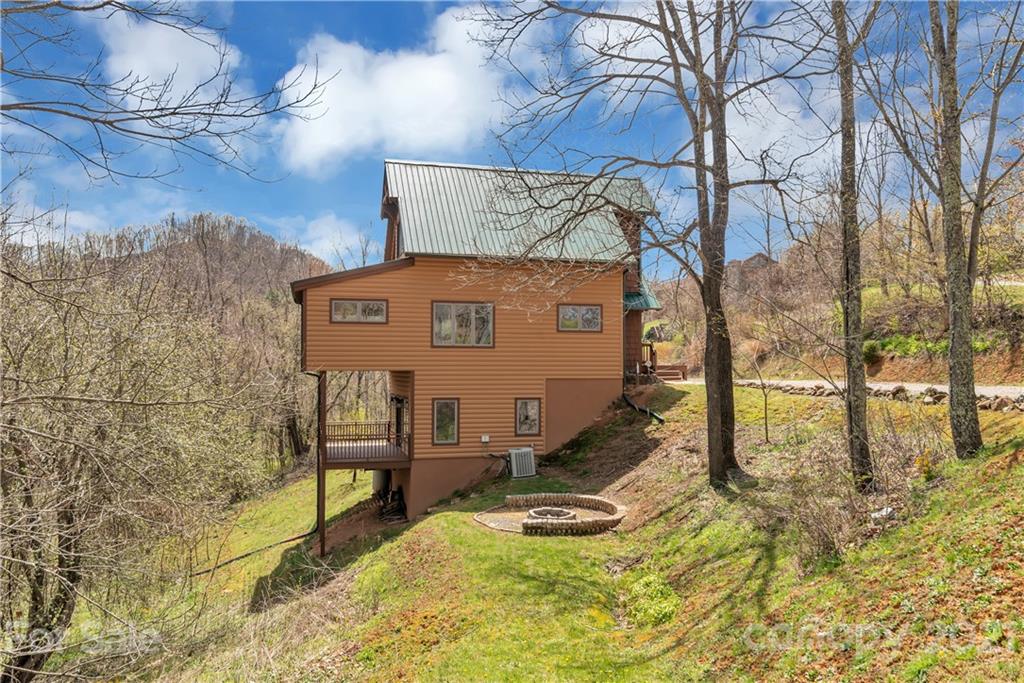 2794 Utah Mountain Road Waynesville, NC 28785 - Photo 26 of 27 a view of a backyard of the house