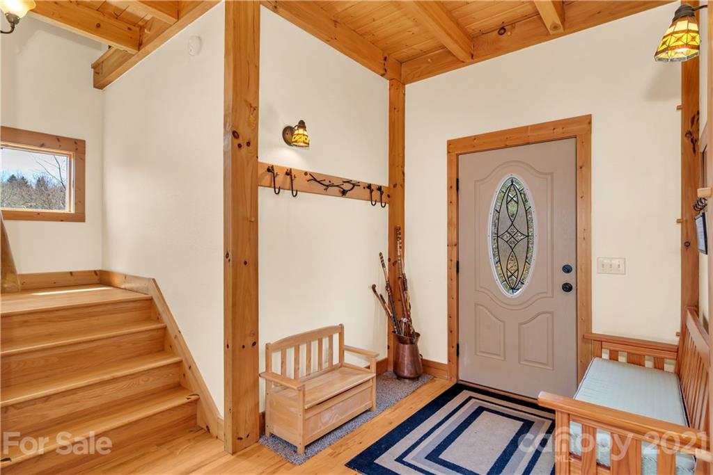 2794 Utah Mountain Road Waynesville, NC 28785 - Photo 4 of 27 a view of an entryway with wooden floor