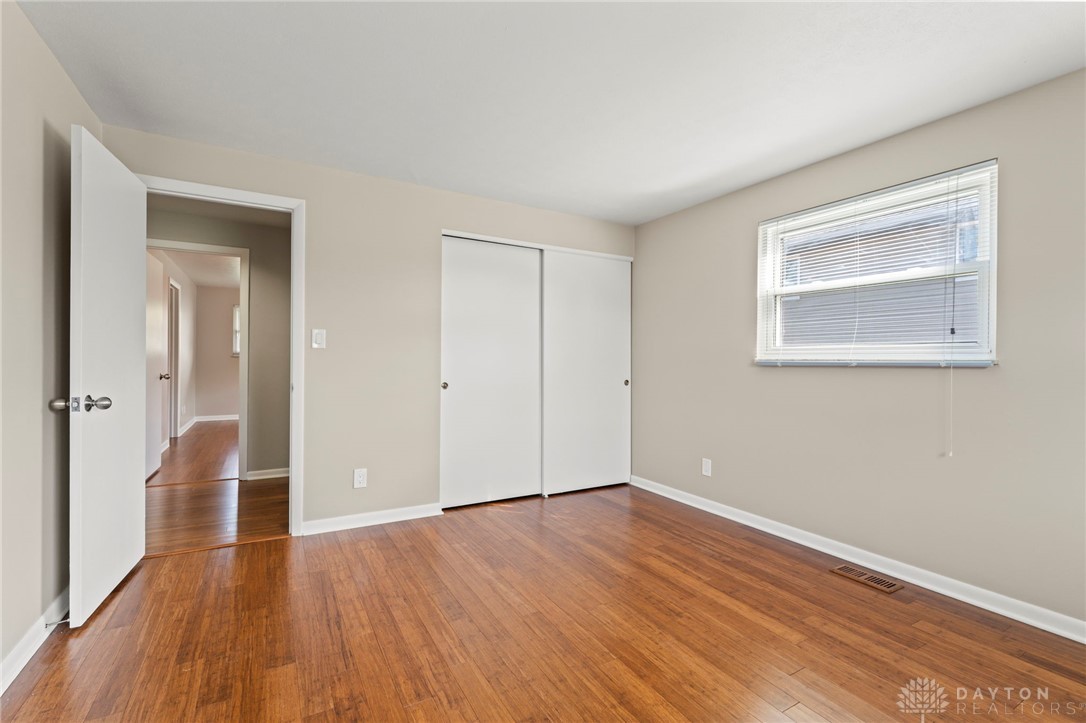 2247 East Whipp Road Dayton, OH 45440 - Photo 32 of 52 Bright and airy room featuring warm wood flooring and ample natural light.