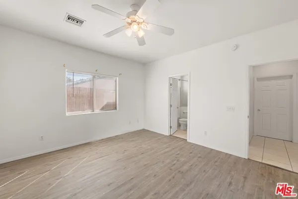 en empty room with windows