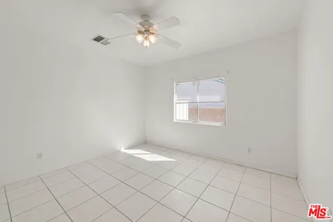 a bathroom with a sink toilet tub and shower