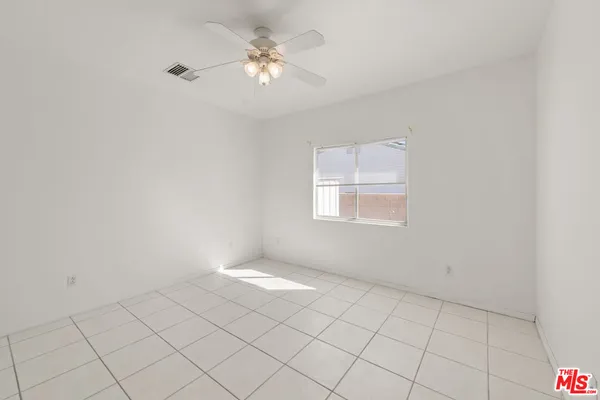 a view of a swimming pool with a bench and a lake view