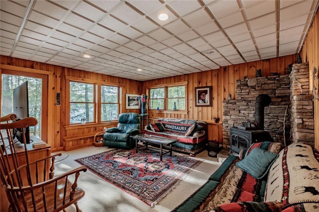 76 Miller Road Casco, ME 04015 - Photo 18 of 35 Family room with woodstove