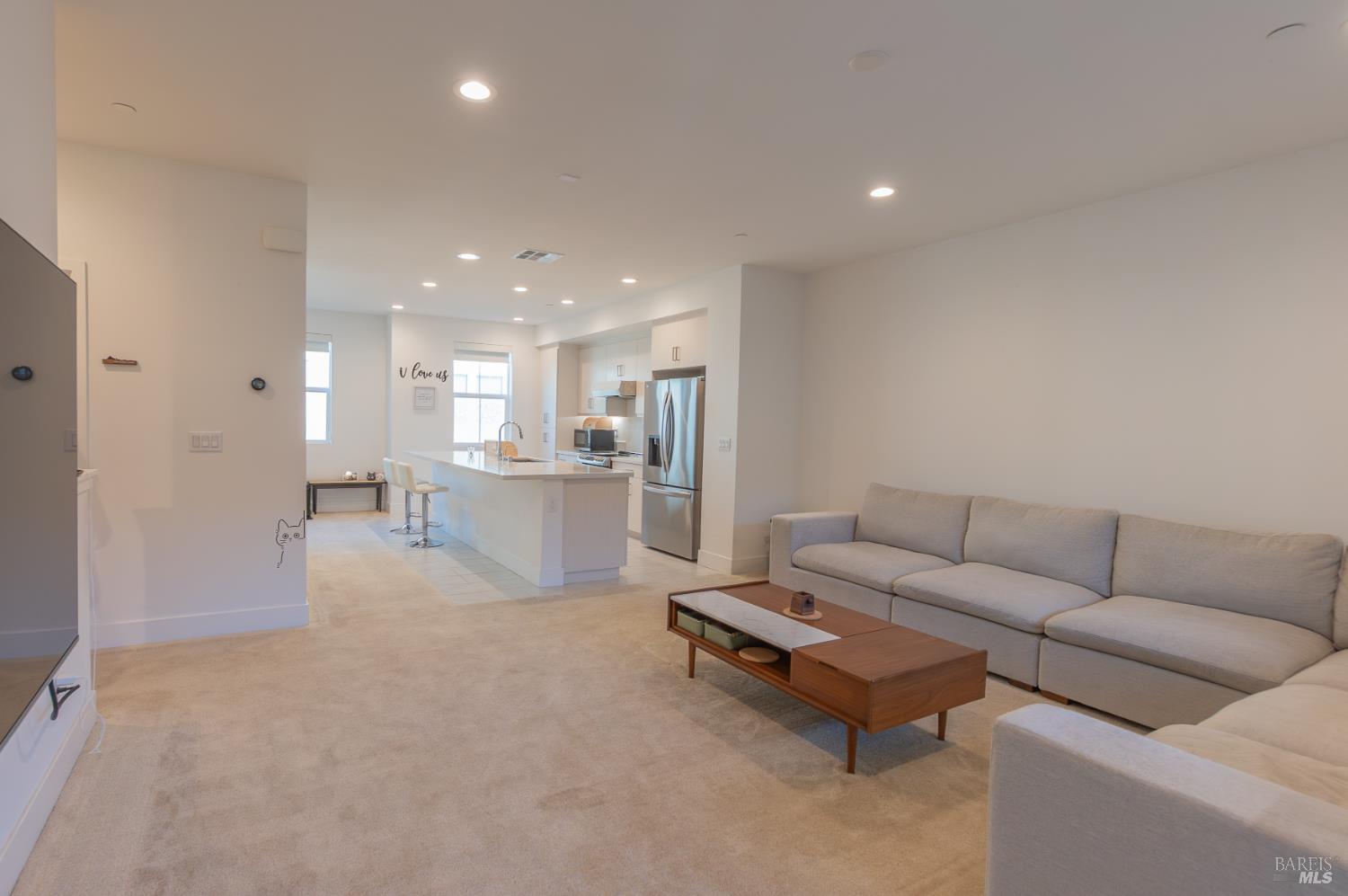 306 Rockview Road Novato, CA 94949 - Photo 2 of 37 a living room with furniture and a kitchen view