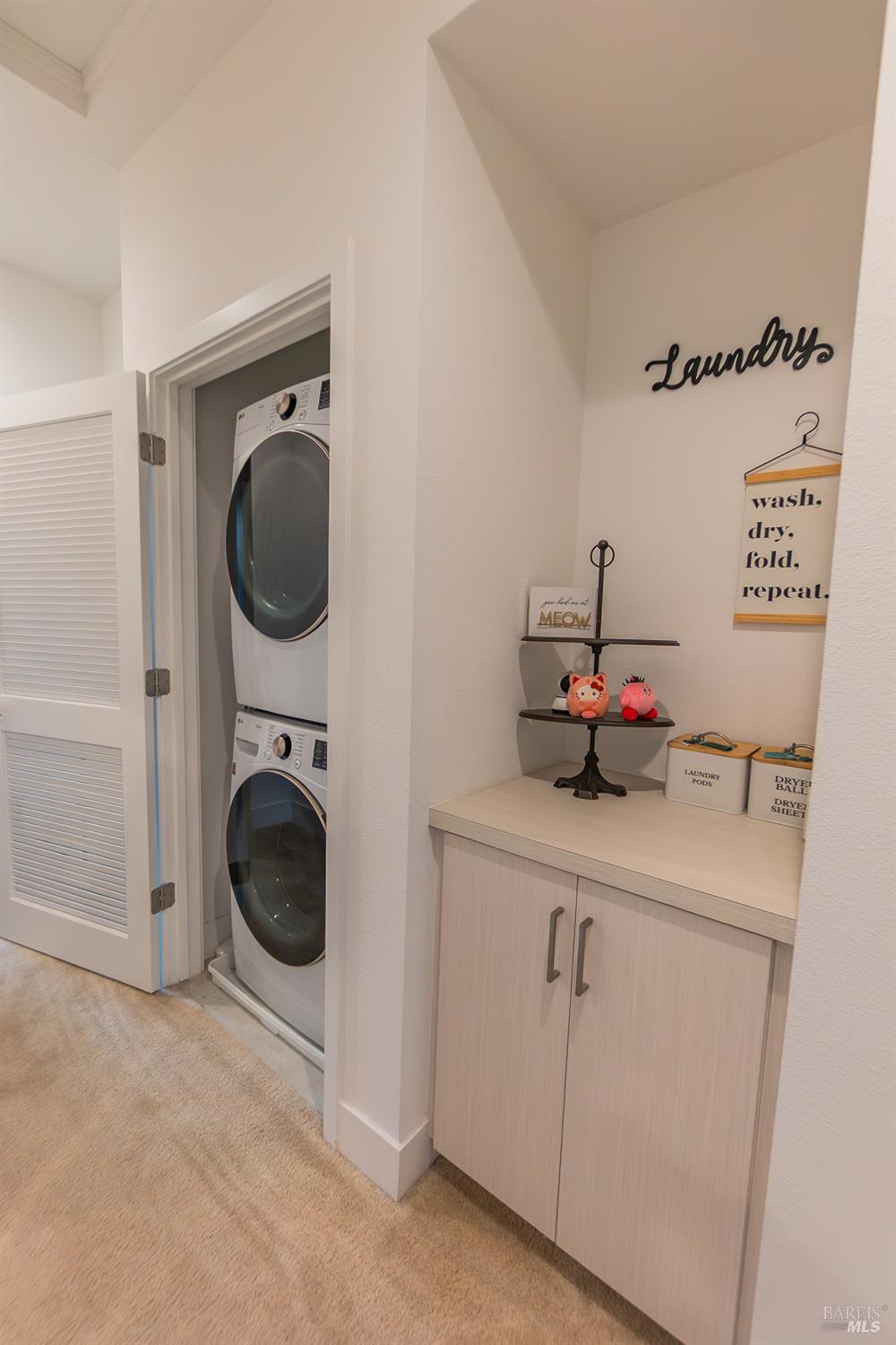 306 Rockview Road Novato, CA 94949 - Photo 21 of 37 a utility room with sink dryer and washer