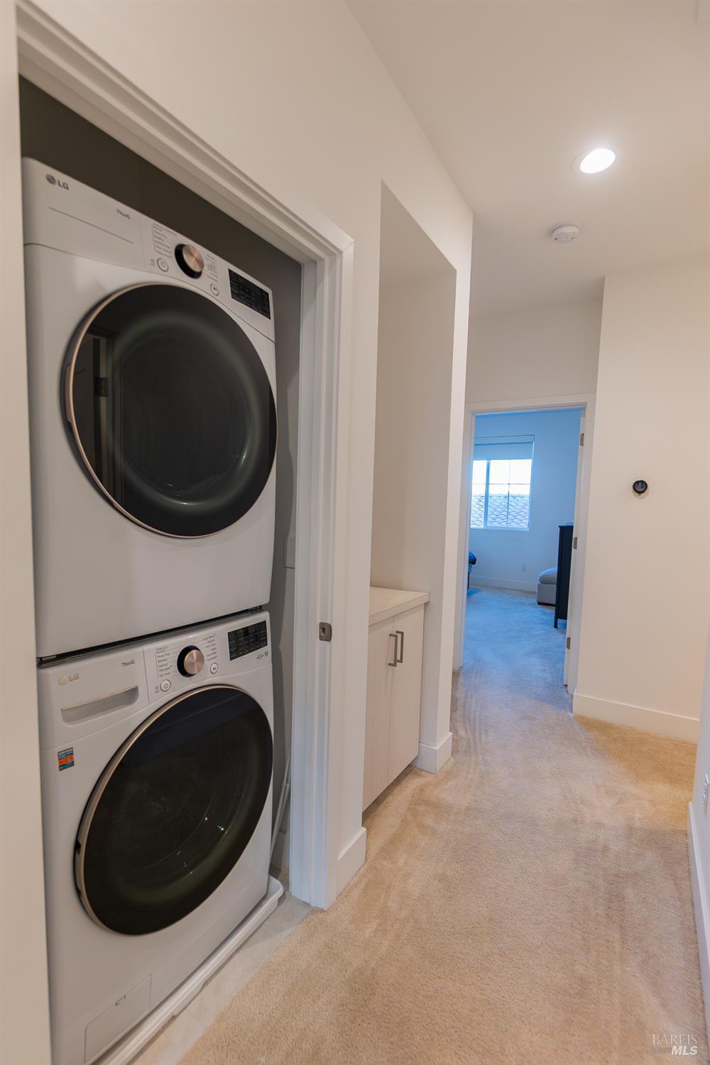 306 Rockview Road Novato, CA 94949 - Photo 22 of 37 a view of a hallway with washer and dryer