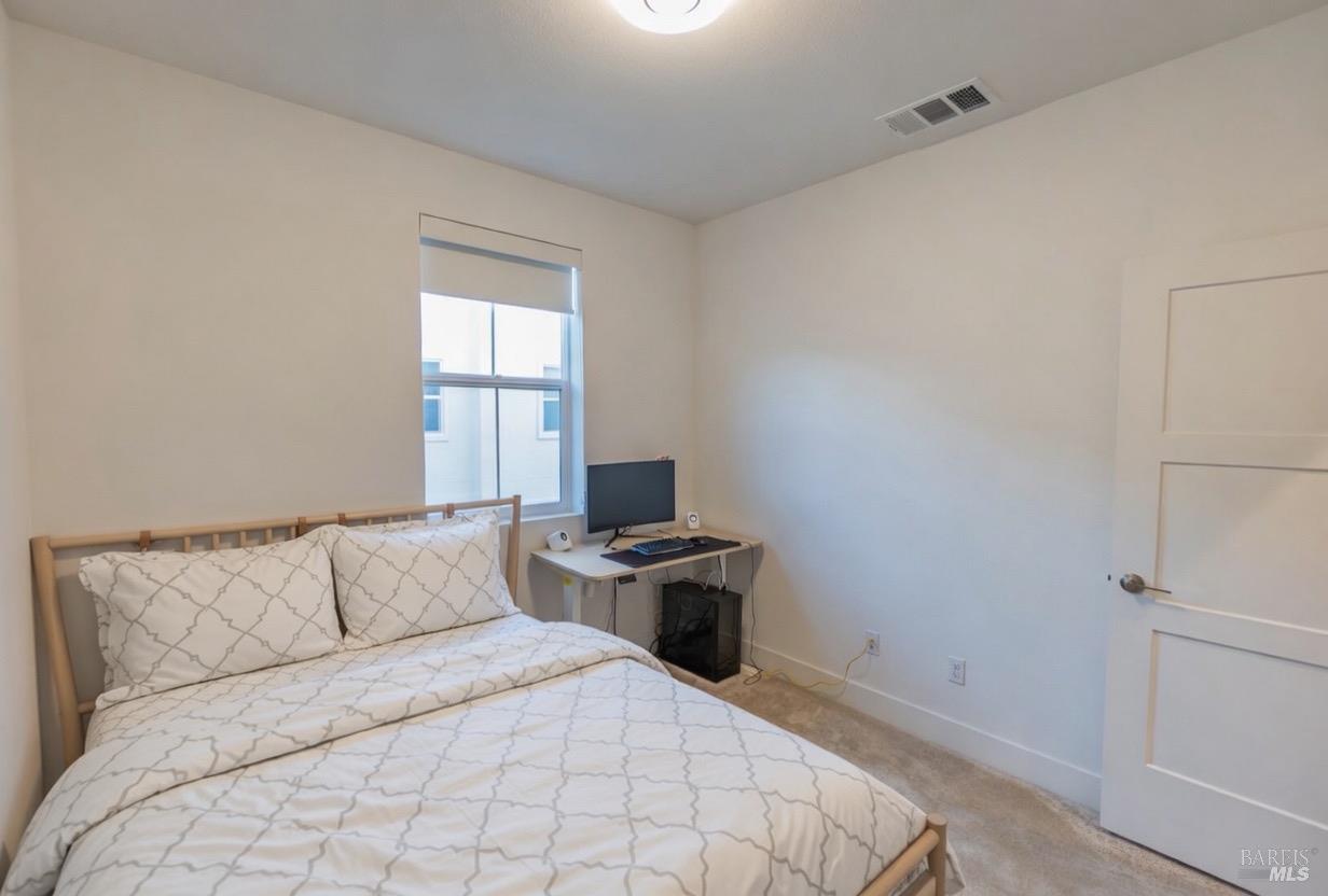 306 Rockview Road Novato, CA 94949 - Photo 27 of 37 a bedroom with a bed and window