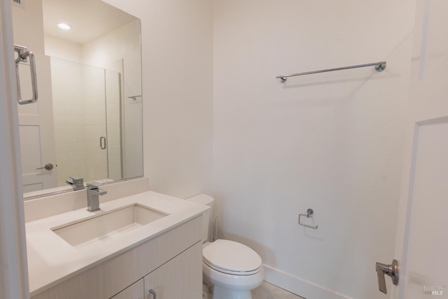 306 Rockview Road Novato, CA 94949 - Photo 9 of 37 a bathroom with a sink toilet vanity and shower