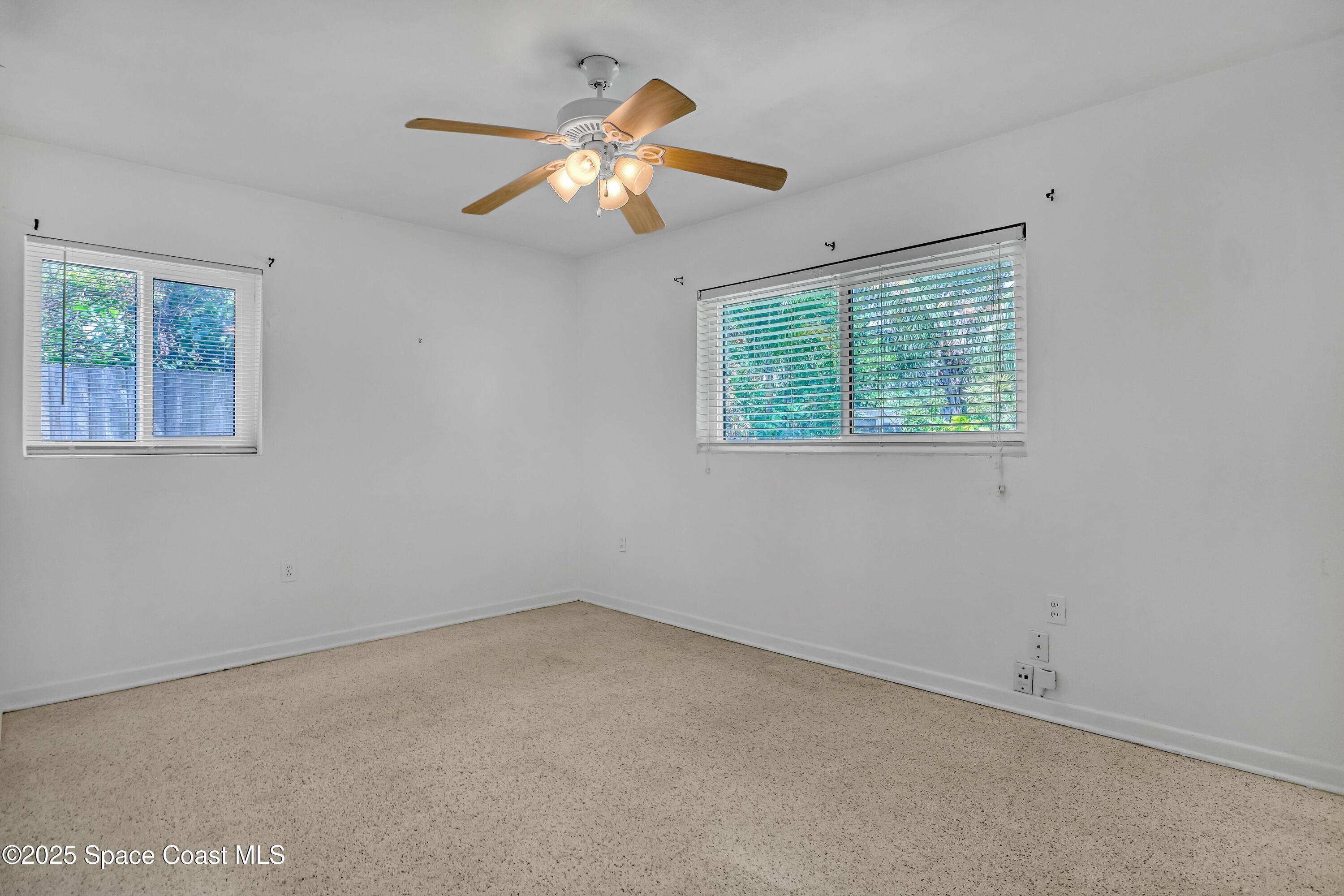 955 Samar Road Cocoa Beach, FL 32931 - Photo 25 of 37 an empty room with a window