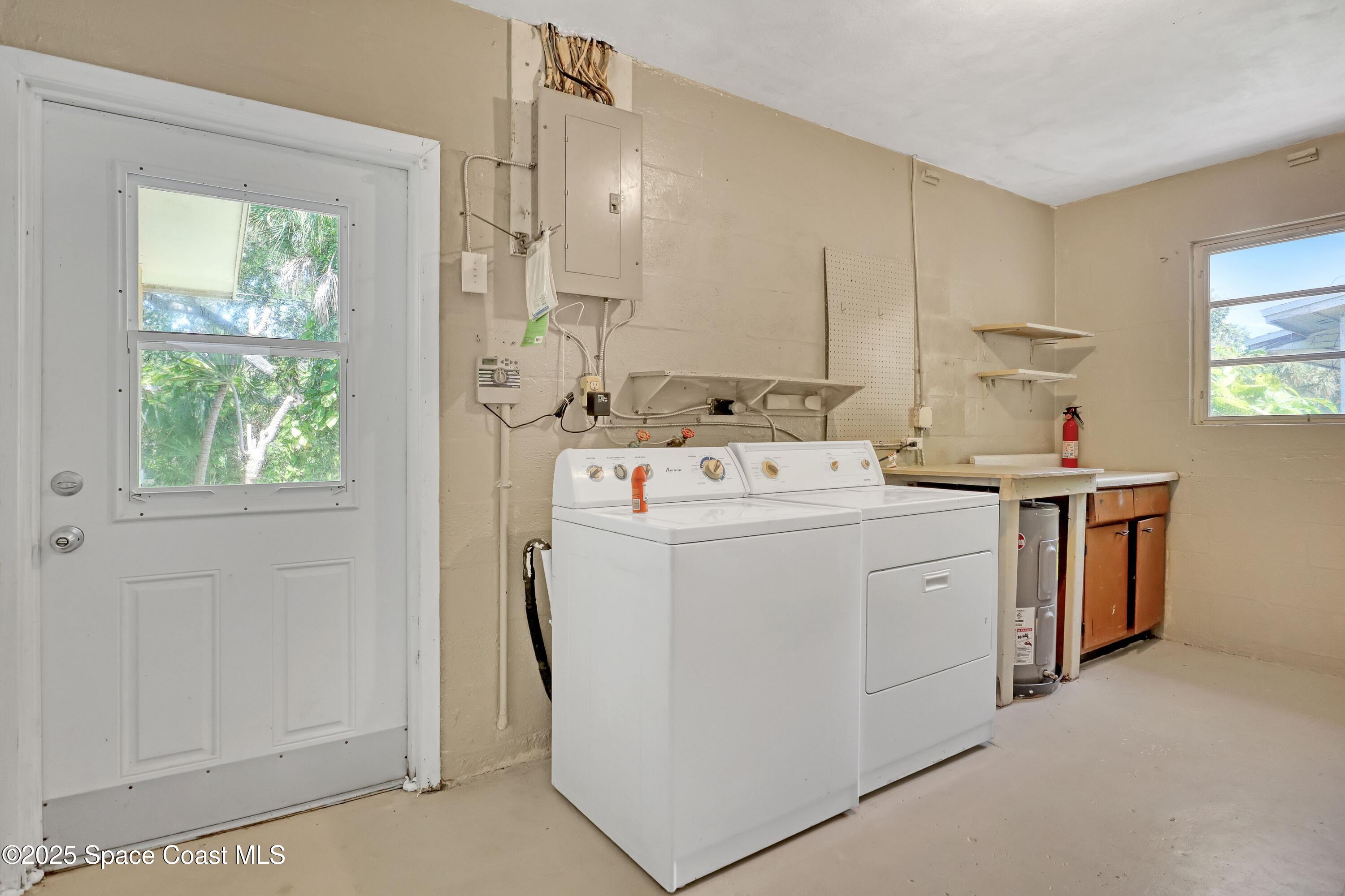 955 Samar Road Cocoa Beach, FL 32931 - Photo 32 of 37 a utility room with dryer and washer