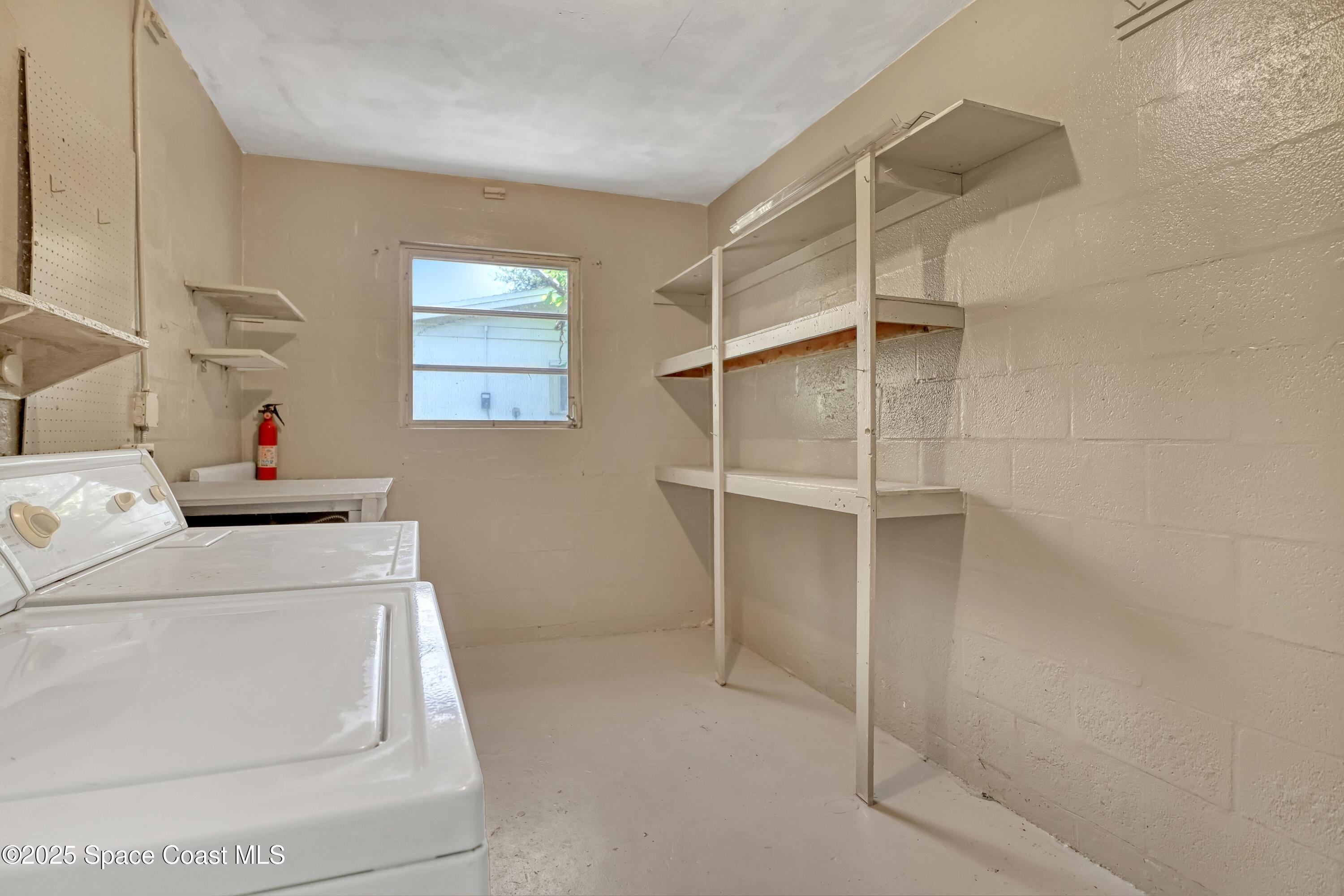 955 Samar Road Cocoa Beach, FL 32931 - Photo 33 of 37 a utility room with dryer and washer