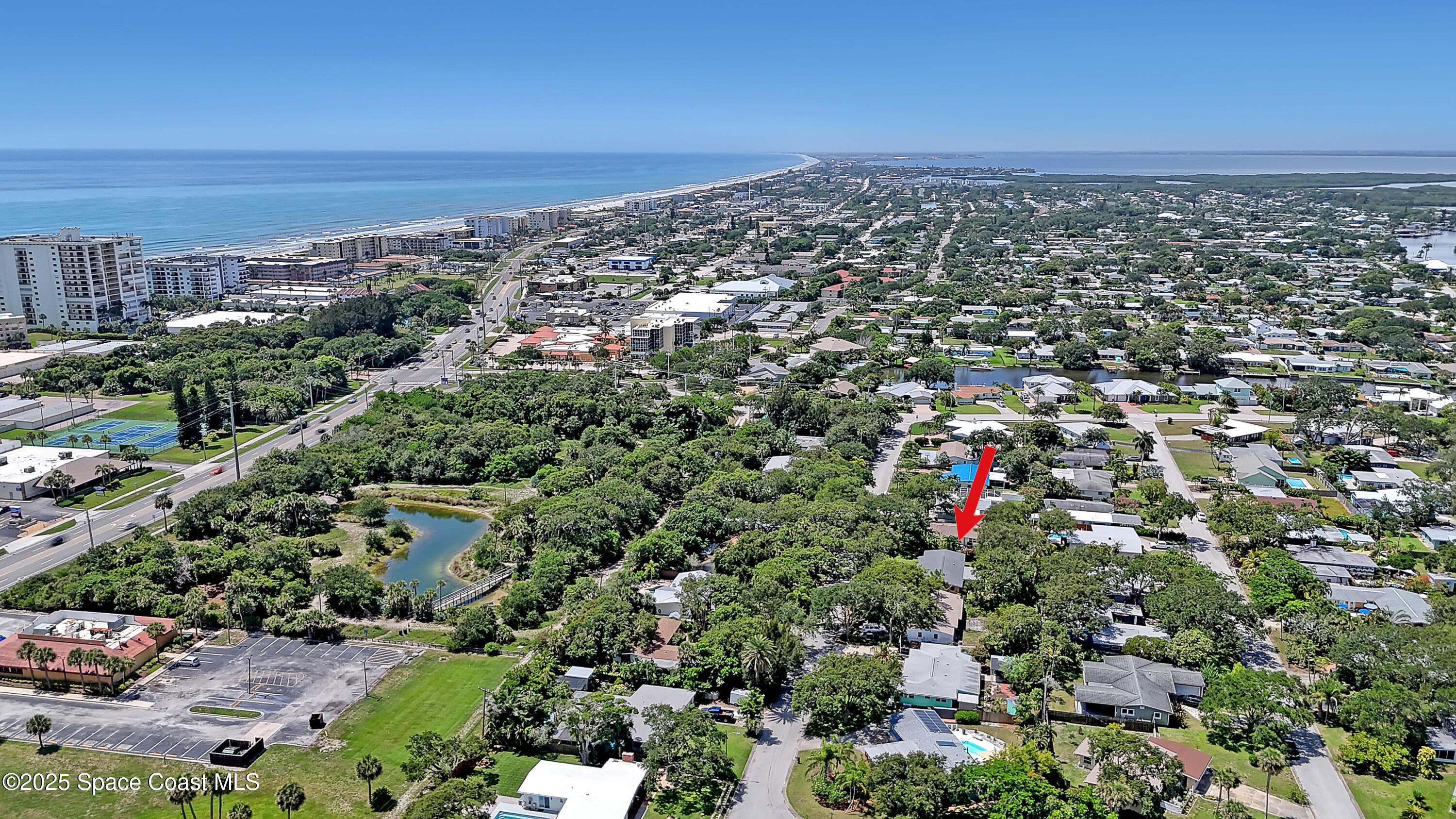 955 Samar Road Cocoa Beach, FL 32931 - Photo 6 of 37 an aerial view of multiple house