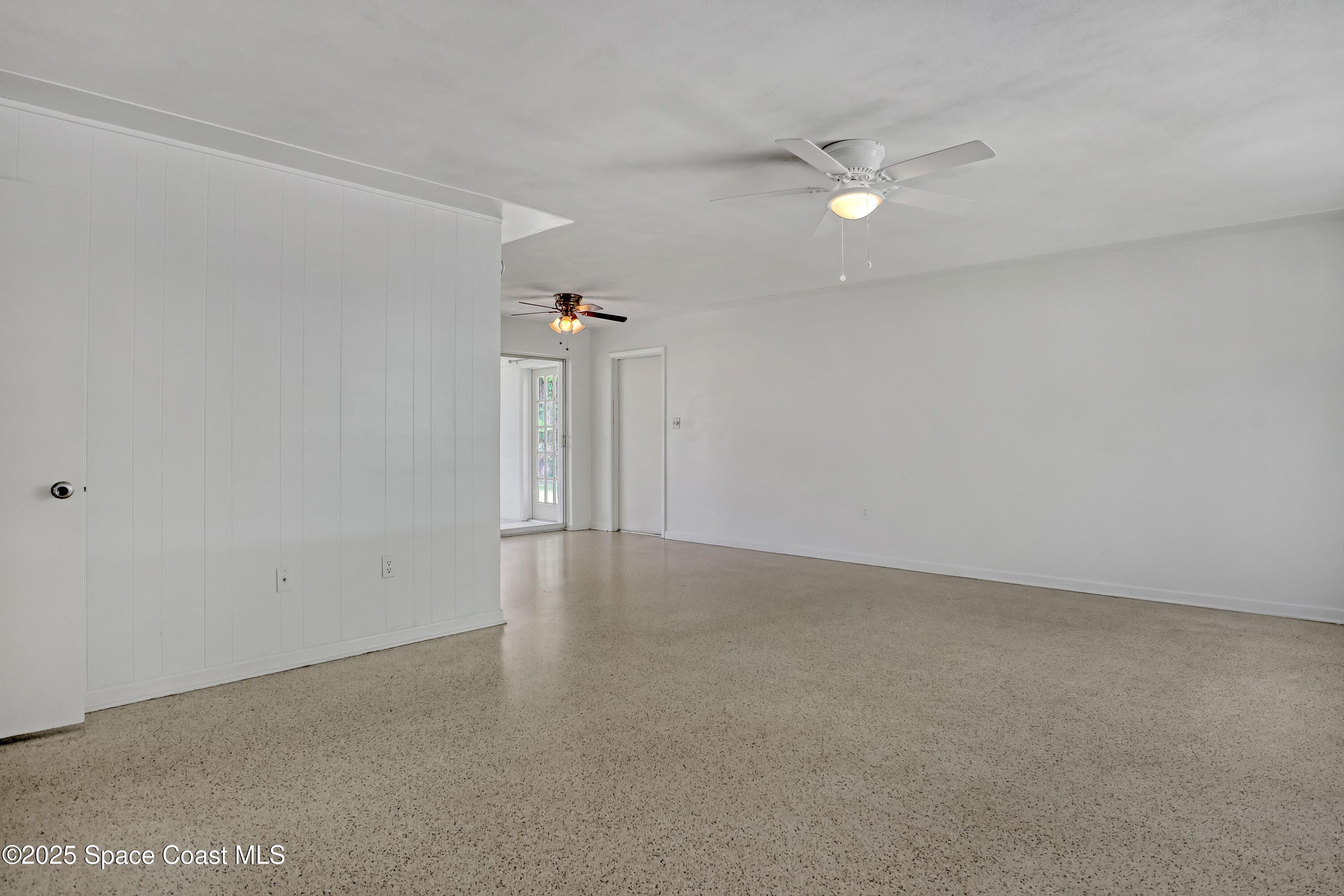 955 Samar Road Cocoa Beach, FL 32931 - Photo 10 of 37 a view of an empty room