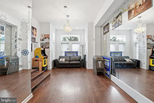 a room with lots of furniture and windows