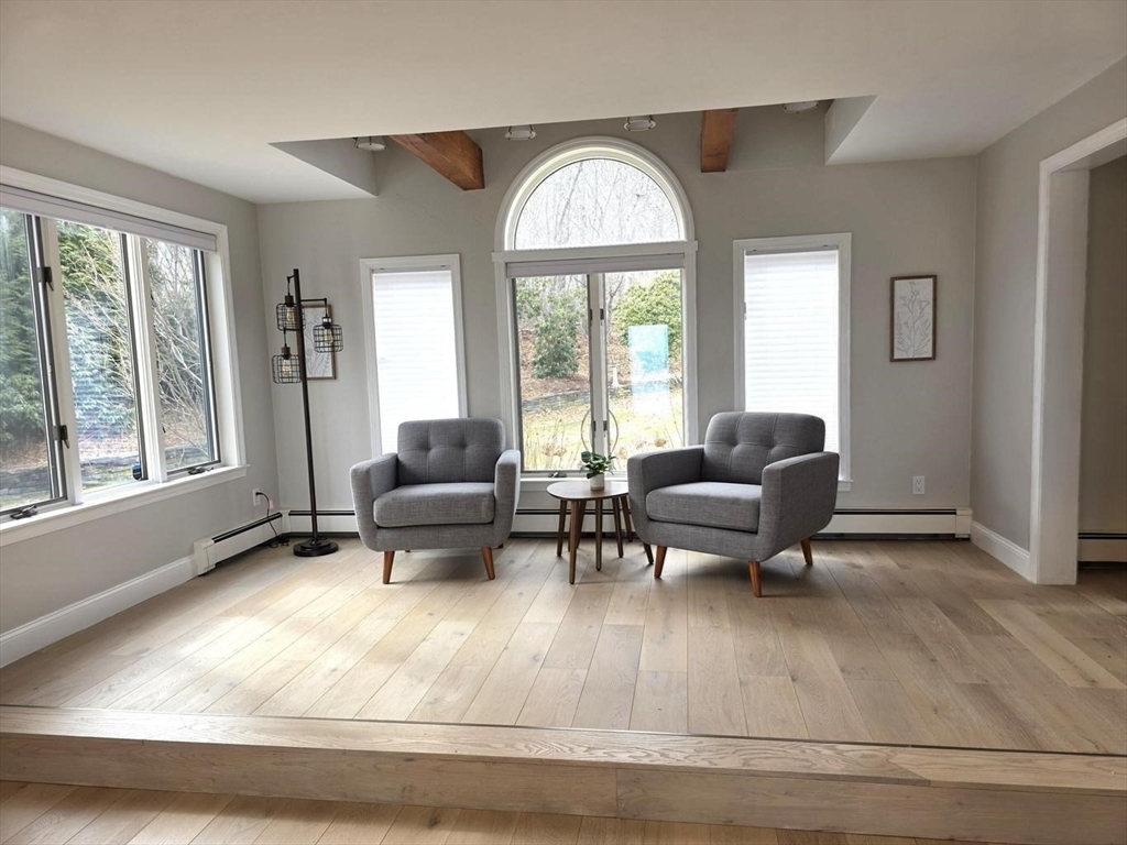 31 Ellisville Road Plymouth, MA 02360 - Photo 11 of 40 a living room with furniture and a large window