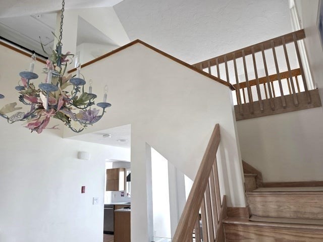 31 Ellisville Road Plymouth, MA 02360 - Photo 16 of 40 a view of a livingroom with furniture and chandelier